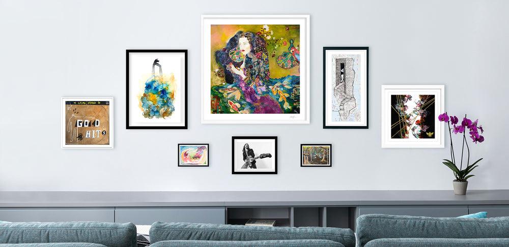 from blank wall to masterpiece: how to create a gallery wall in your home