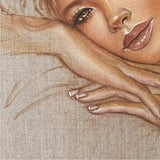 cropped image from a painting of a woman from the shoulders up, she has honey colored eyes and is leaning her head against her hands