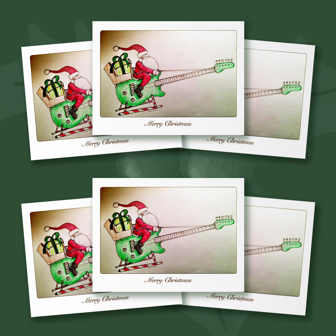 $10 - santa on his guitar sleigh set of 6 - 5 x 7 inch christmas card