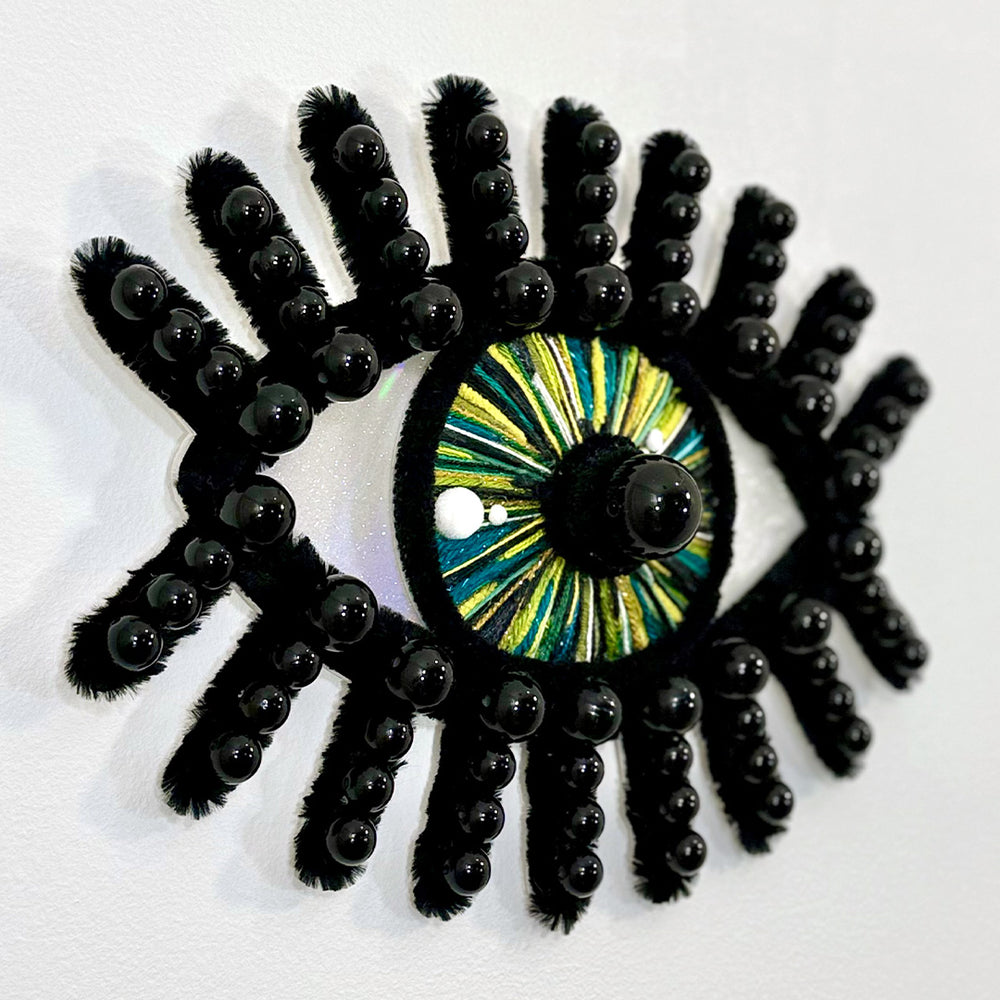 
                  
                    esmeralda wall hanging
                  
                