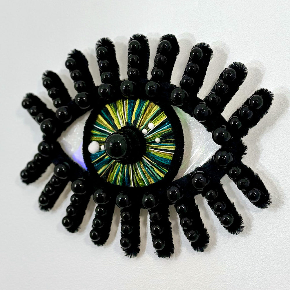 
                  
                    esmeralda wall hanging
                  
                