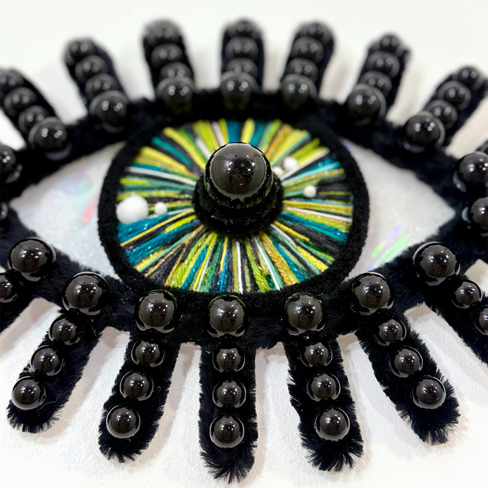 
                  
                    esmeralda wall hanging
                  
                