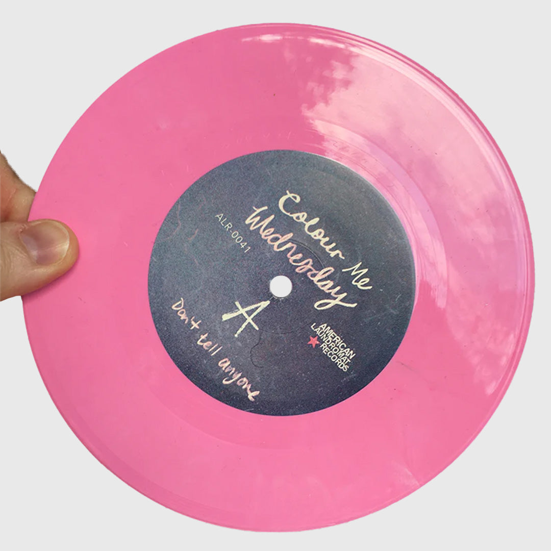 don't tell anyone - 7 inch pink vinyl