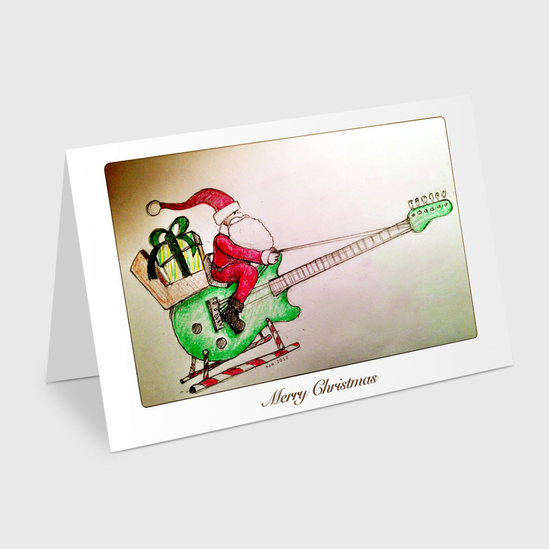 santa on his guitar sleigh - 5 x 7 inch christmas card